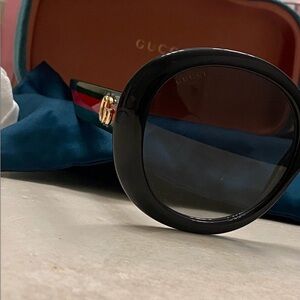 Gucci Black and Gold Round Sunglasses